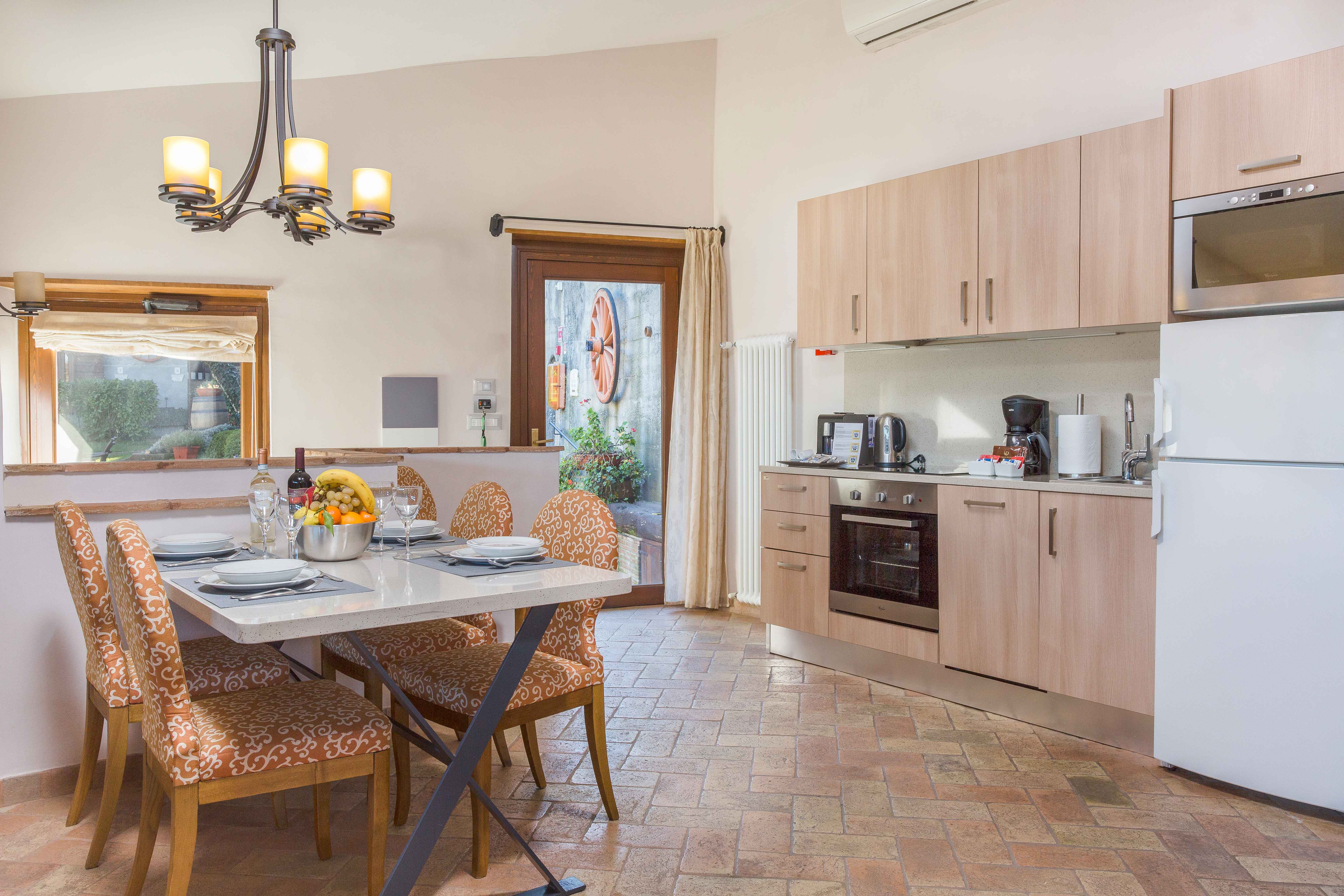 image Share homemade meals in a cozy dining space where warm wood tones invite lingering conversation.