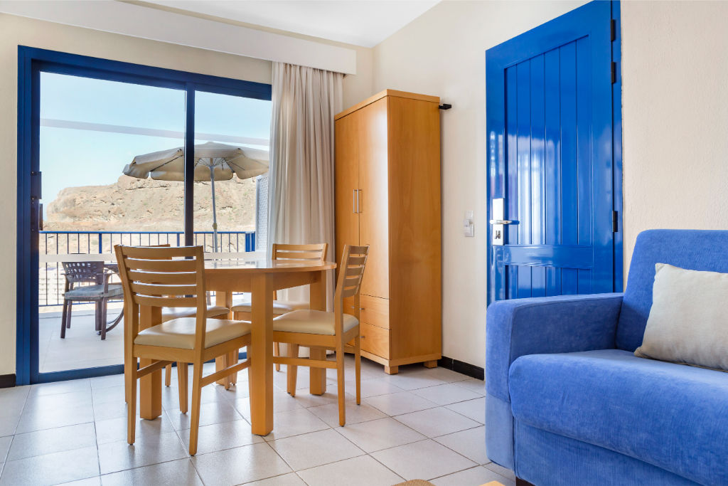 image A cozy living space with all the comforts for a memorable stay.