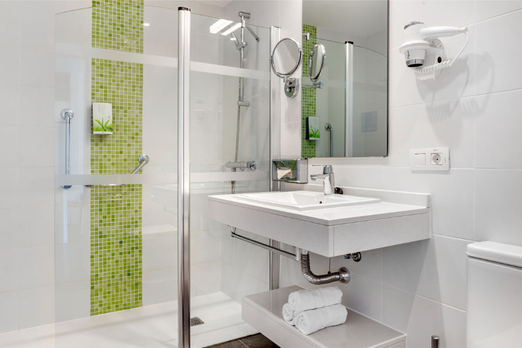 image Sleek and functional bathroom, complete with all the essentials for your comfort.