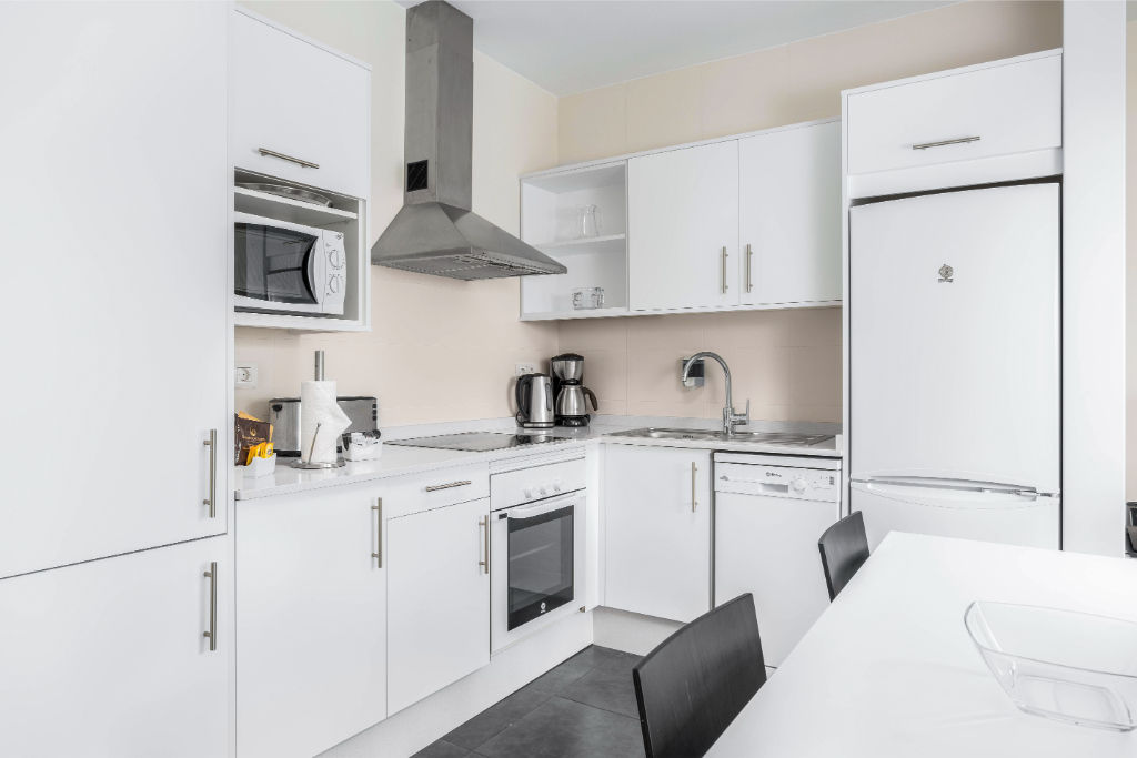 image Sleek kitchen space with modern appliances.