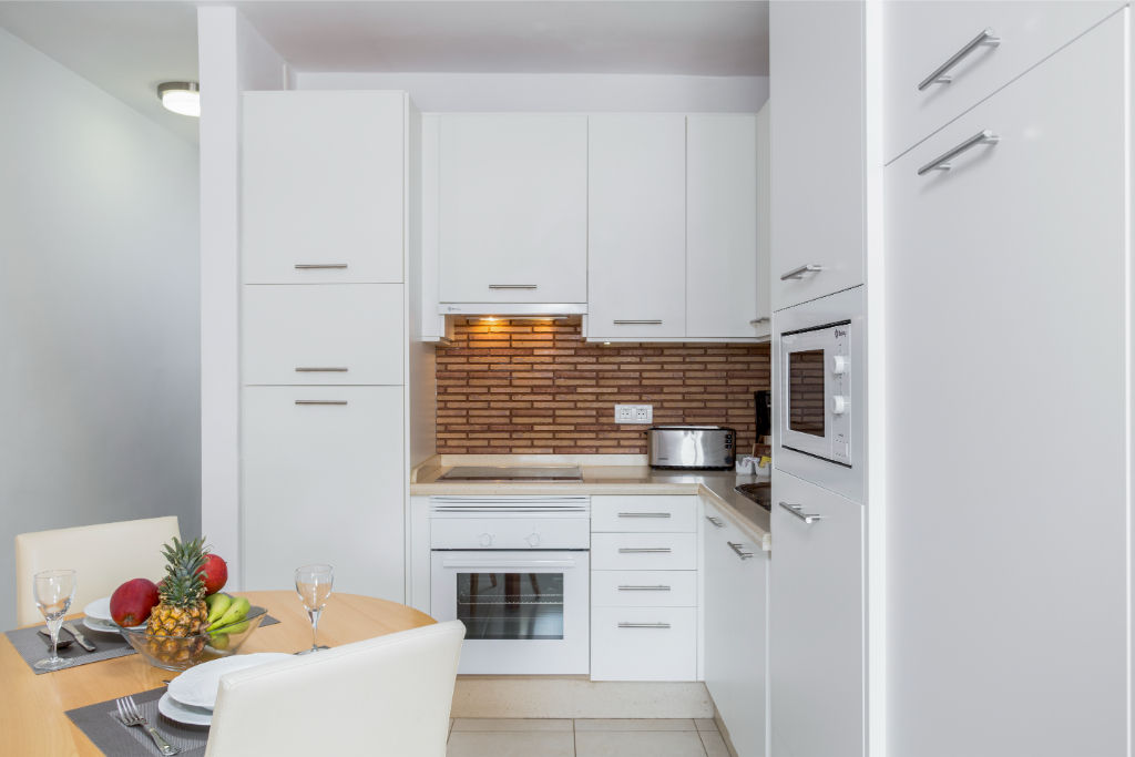 image Prepare your favorite meals in our sleek kitchen.