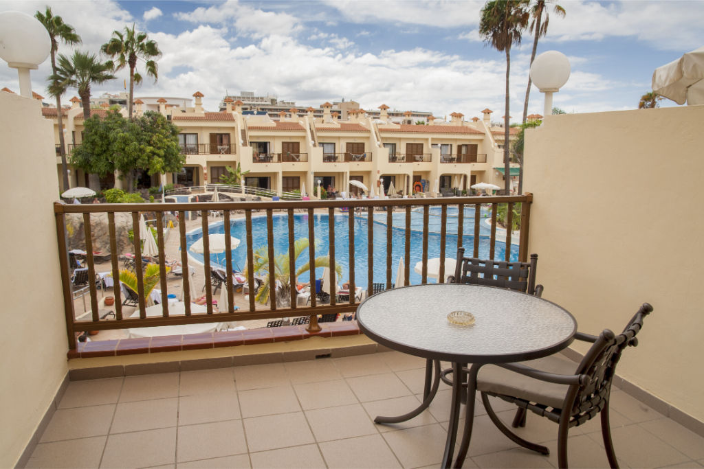 image Balcony access blending indoor comfort with outdoor freshness.