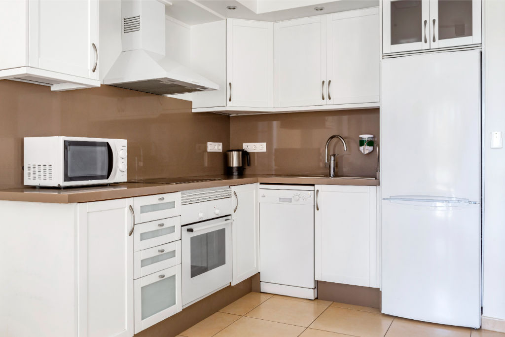 image Compact and functional kitchenette, ideal for preparing simple meals and snacks.