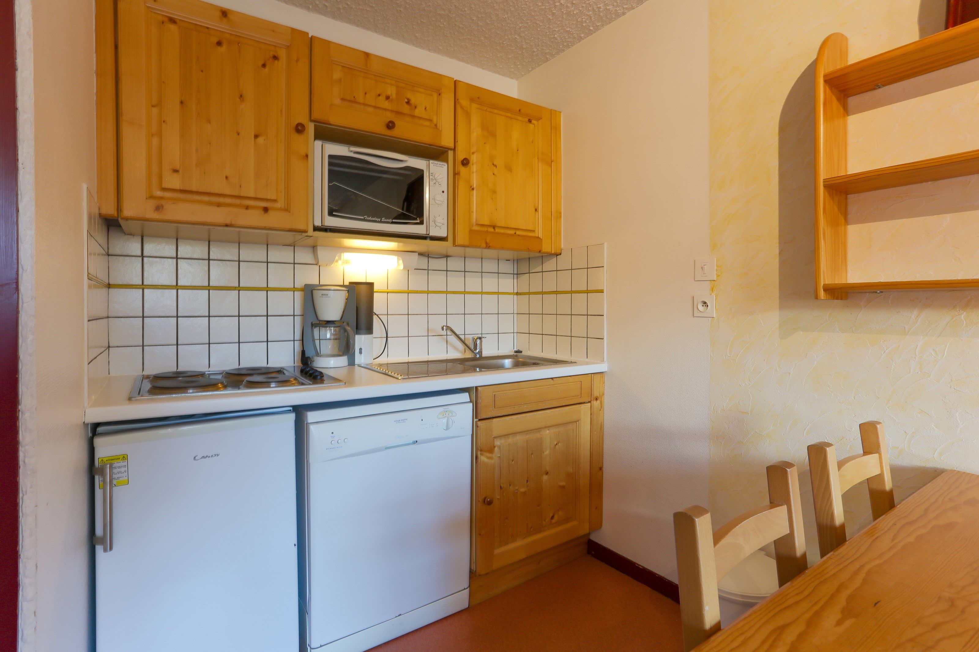 image Curb your appetite by indulging in a snack in your kitchenette!