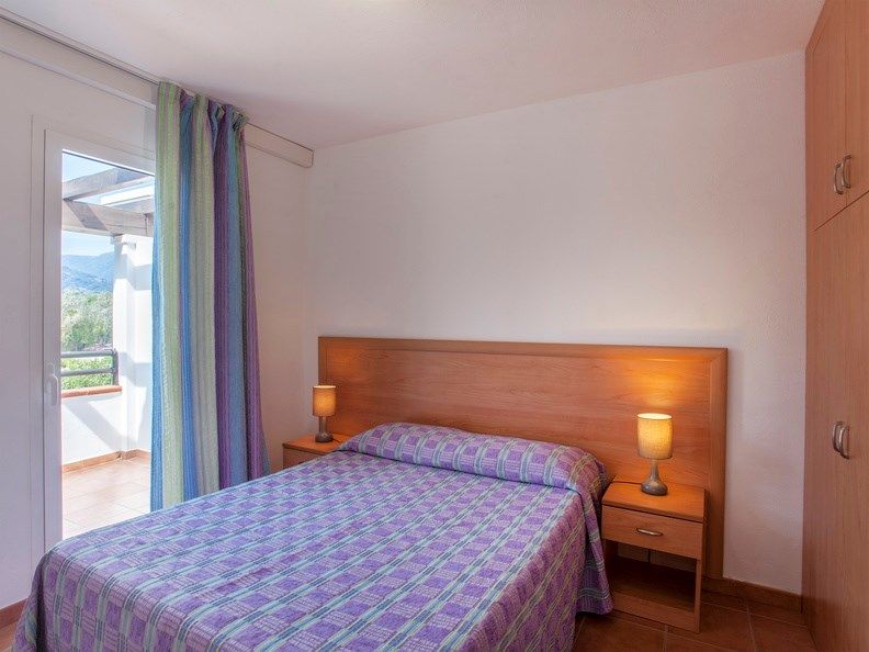 image Drift to sleep in a comfortable bed after a wonderful day outside.