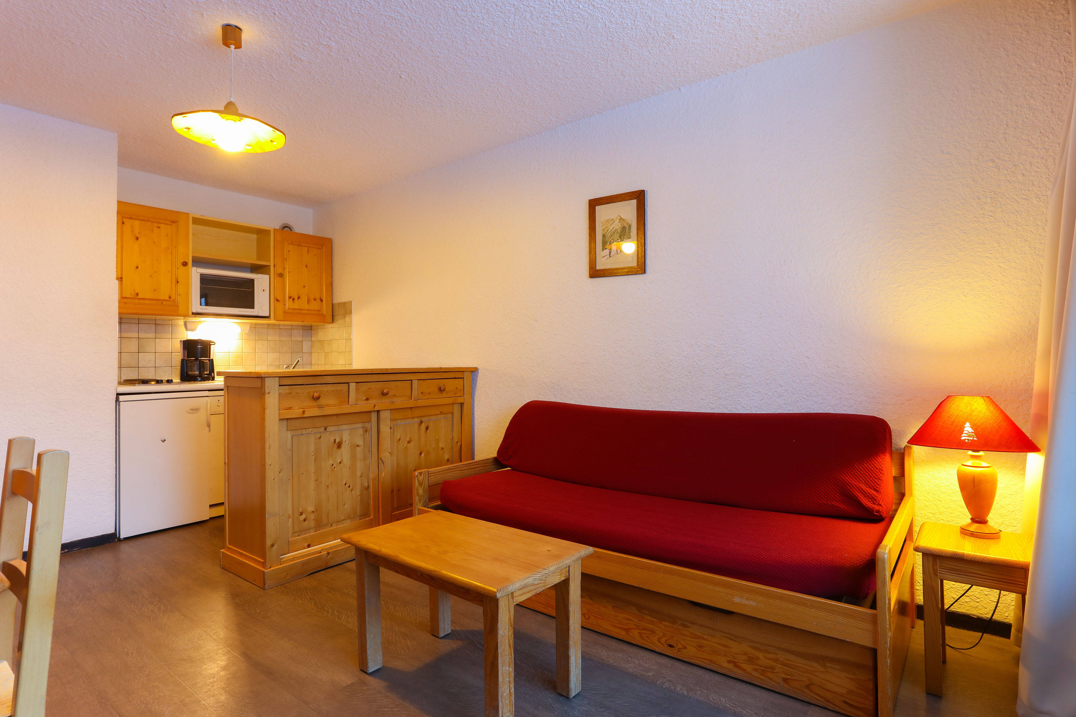 image Snuggle up with a cup of coffee or tea on the comfortable sofa.