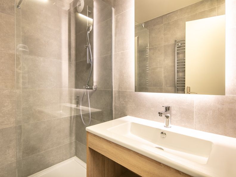 image Freshen up in the bathroom after a day of adventure.