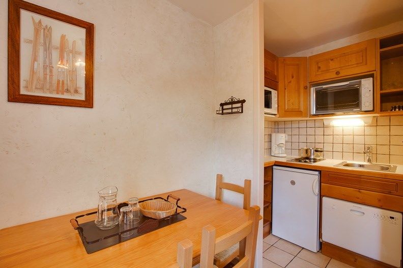 image Settle into the dining area and enjoy a nice meal.