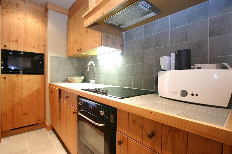 image Prepare a meal in the equipped kitchenette.