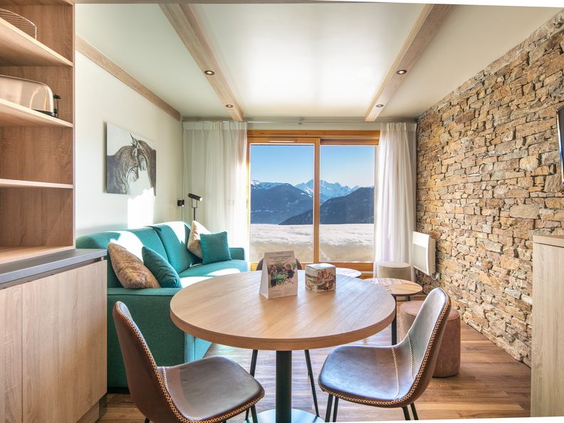 image Settle into the dining area and enjoy a nice meal.