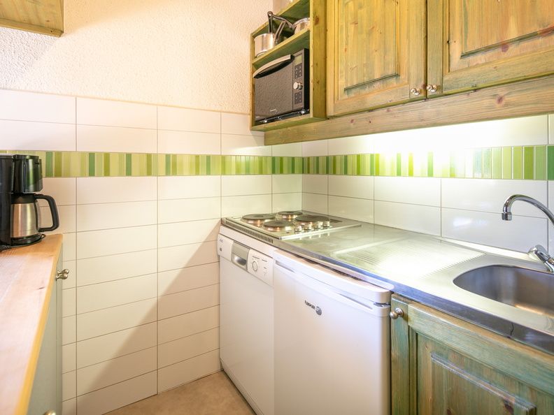 image Prepare a meal in the equipped kitchen.