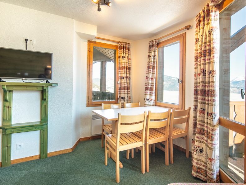 image Settle into the dining area and enjoy a nice meal.