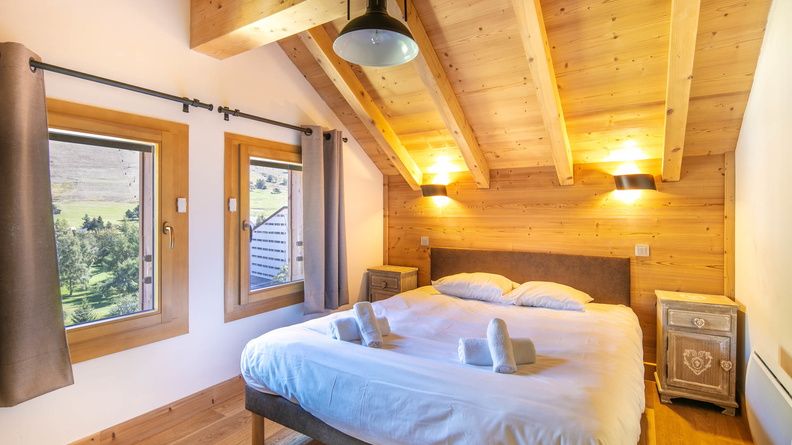 image Drift to sleep in a comfortable bed after a wonderful day outside.