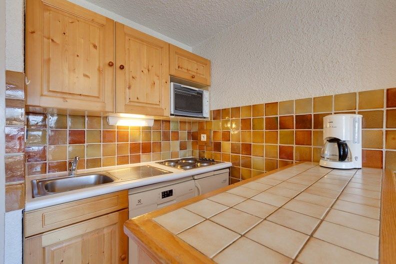 image Prepare a meal in the equipped kitchenette.