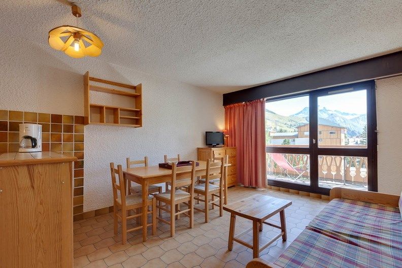 image Settle into the dining area and enjoy a nice meal.