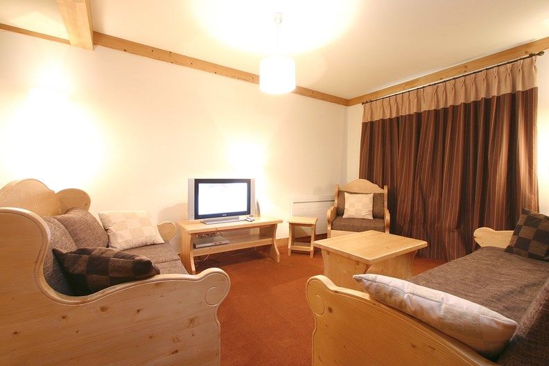 image Kick back your feet and relax in the cozy living area.