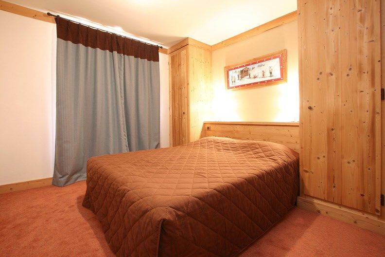 image Drift to sleep in a comfortable bed after a wonderful day outside.