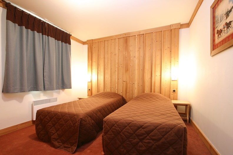 image Relax on the comfy bed after a day outside.