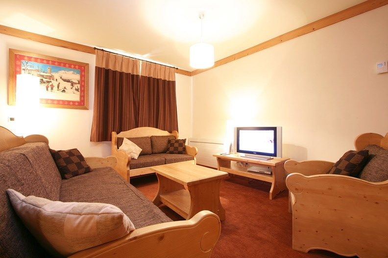 image Kick back your feet and relax in the cozy living area.