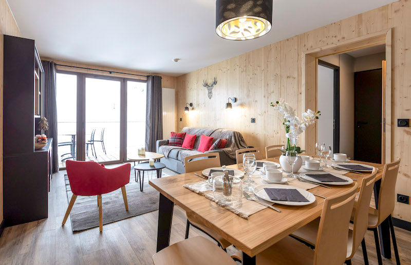 image Settle into the dining area and enjoy a nice meal.