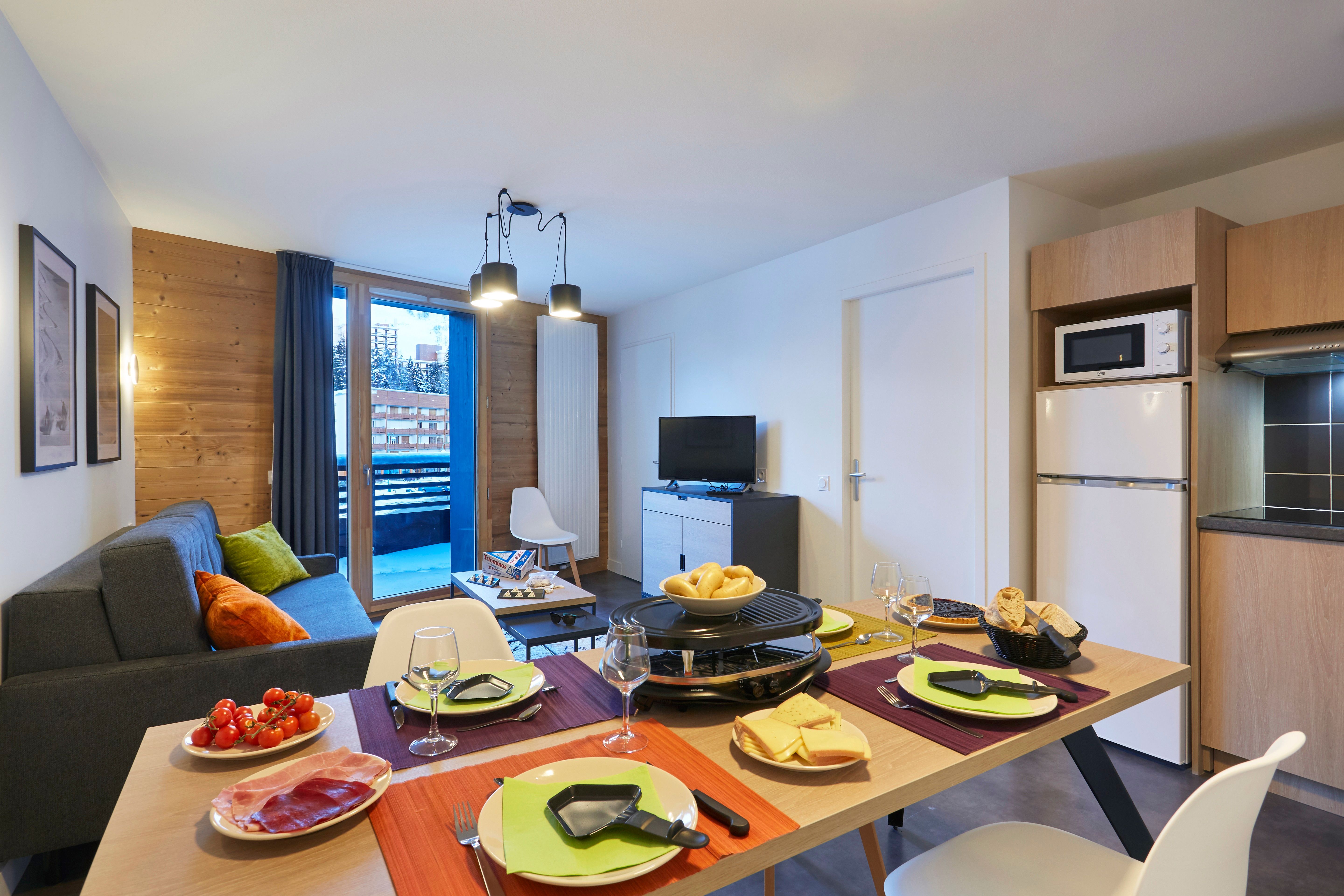 image Share meals and laughs at the dining table.