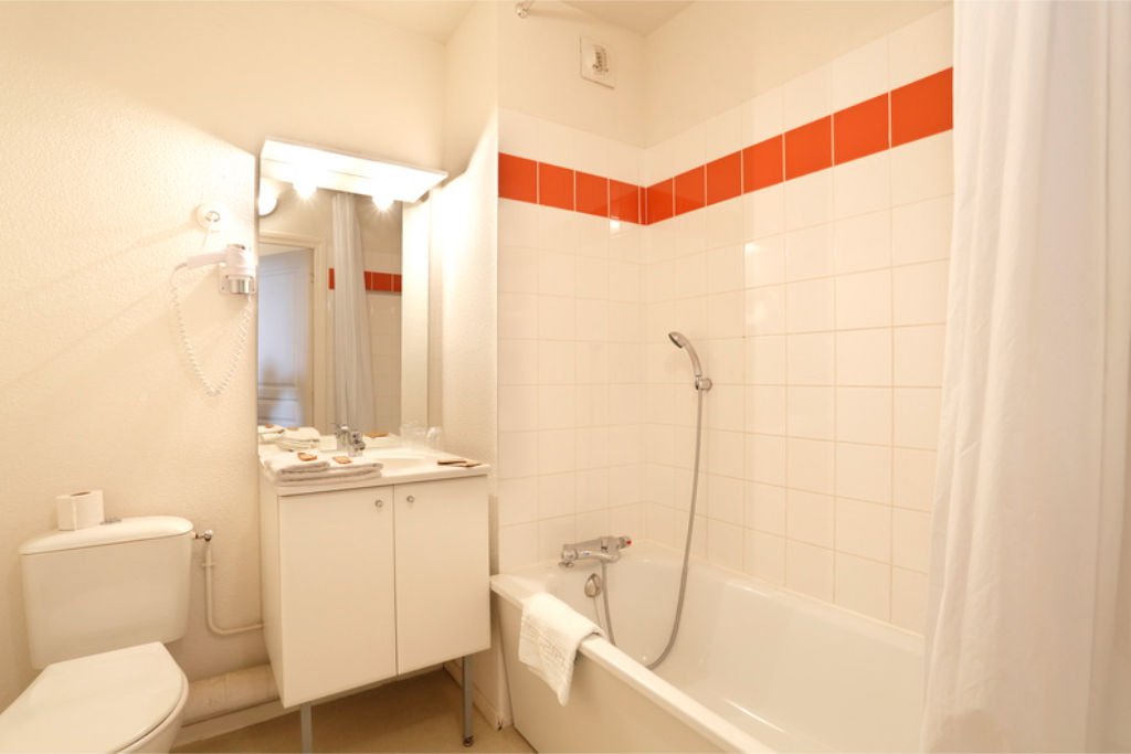image Freshen up in your lovely bathroom.