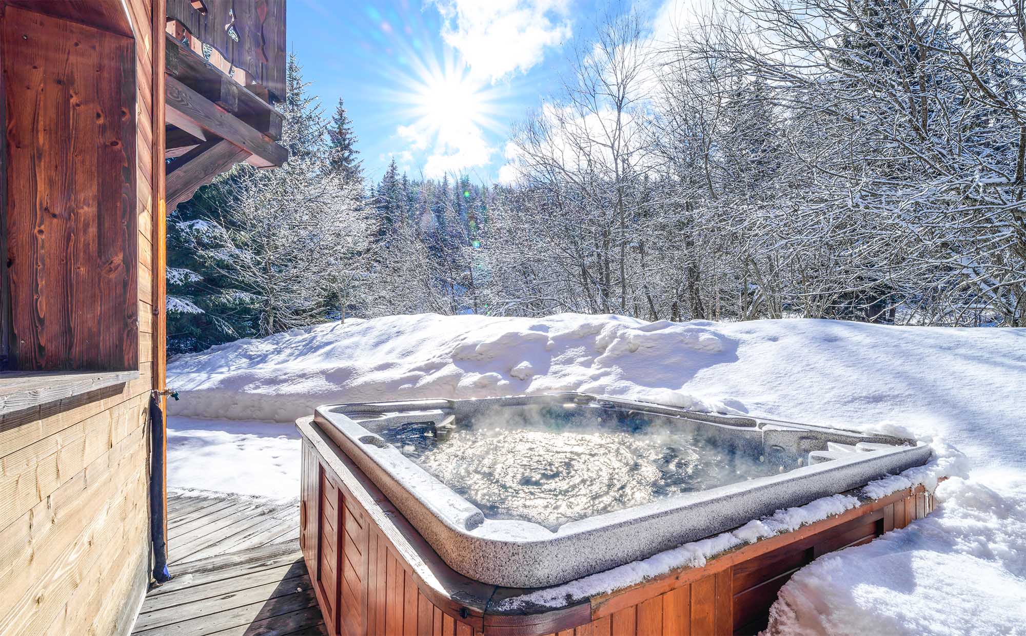 image Soothe your muscles in the private hot tub!