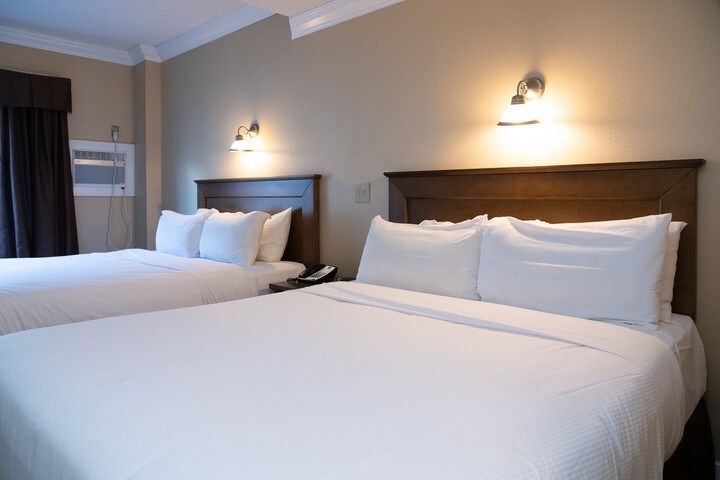 image Drift to sleep in a comfortable bed after a wonderful day outside.