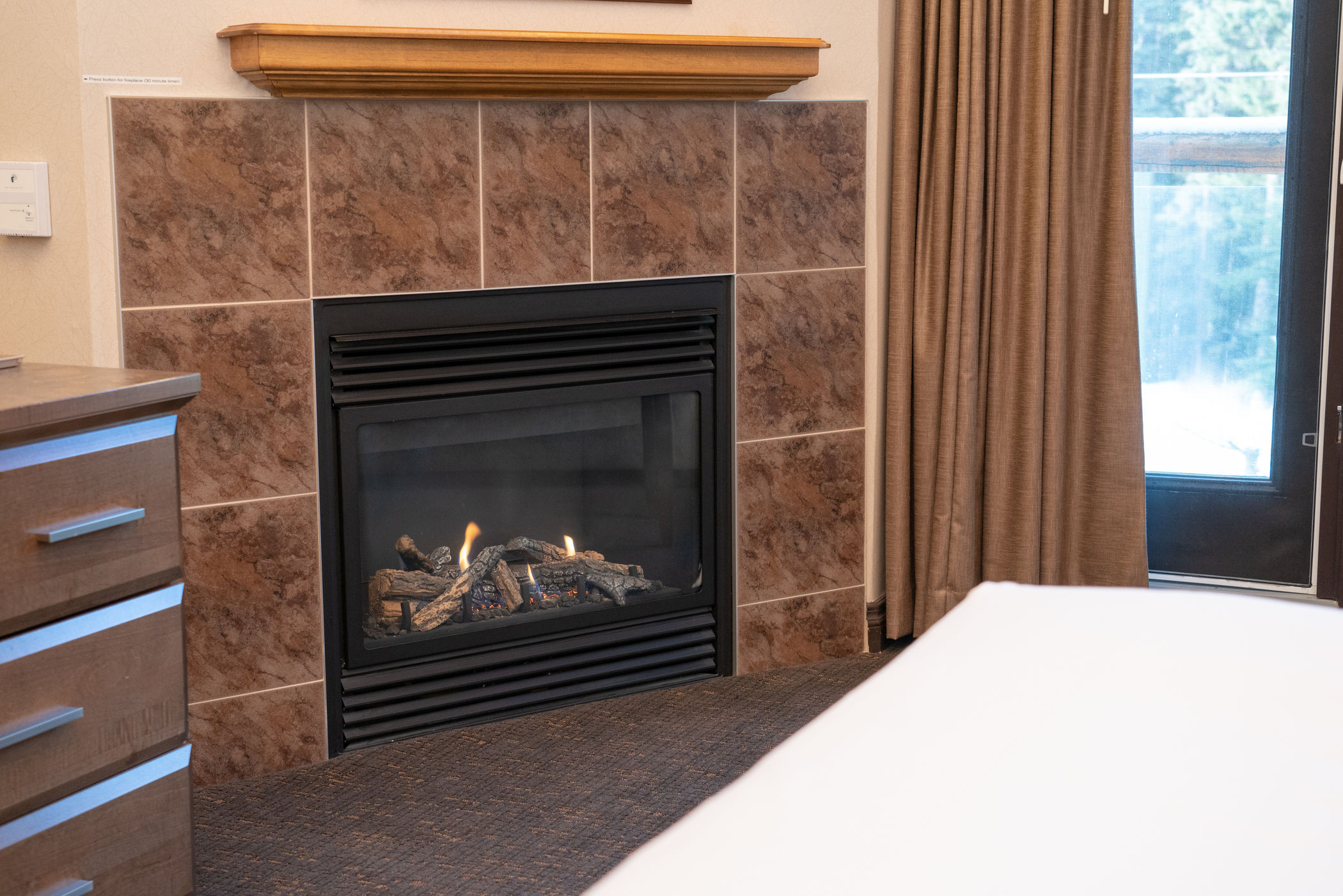 image Warm up around the cozy fireplace. 