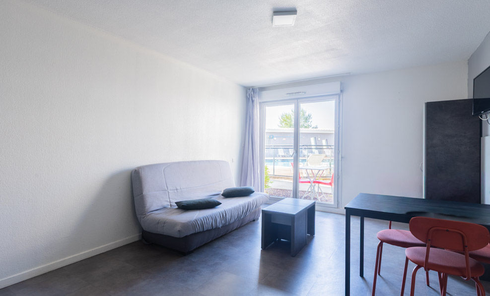 image A sofa and a TV to relax with your closed ones