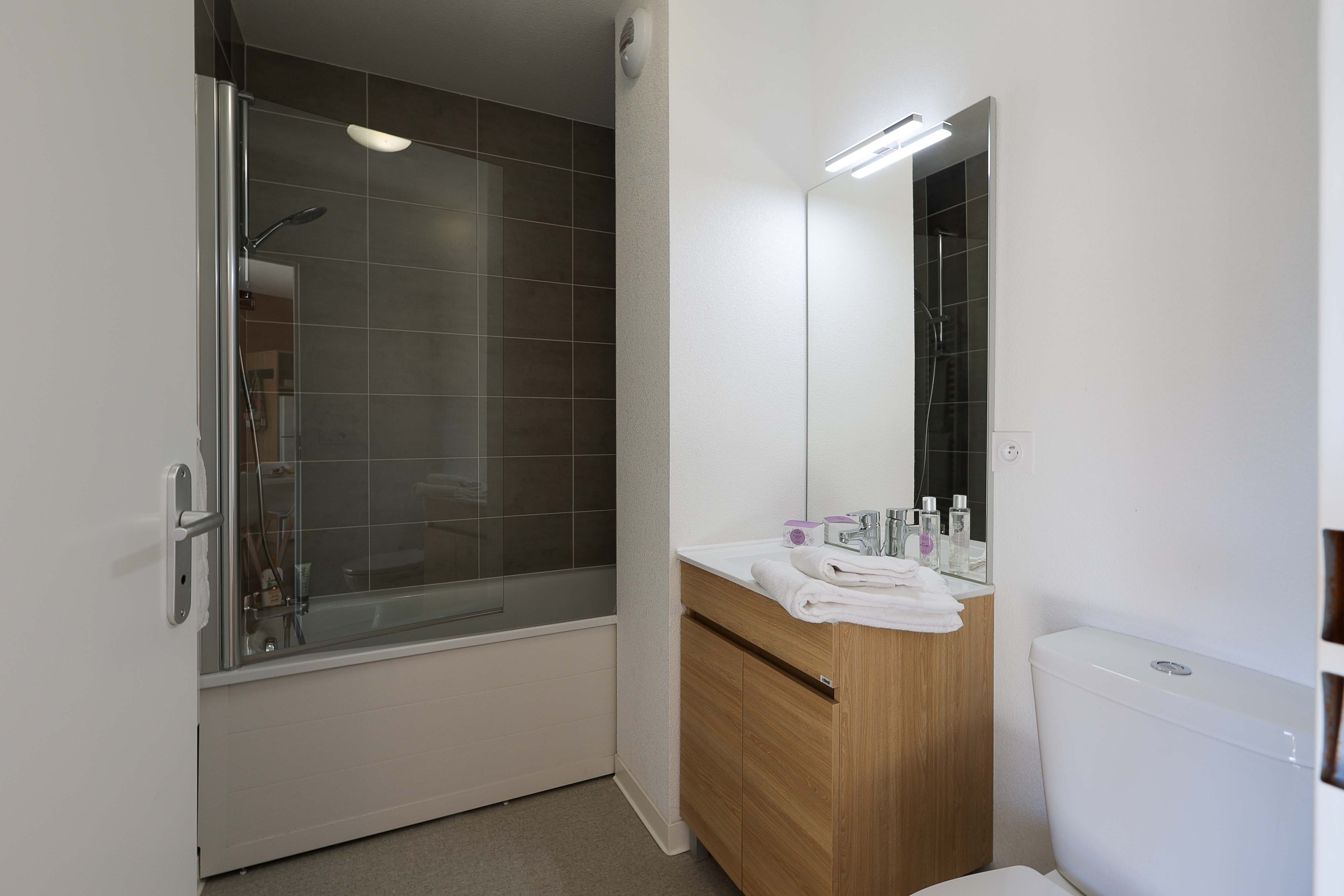 image Get ready for your day in the bathroom.