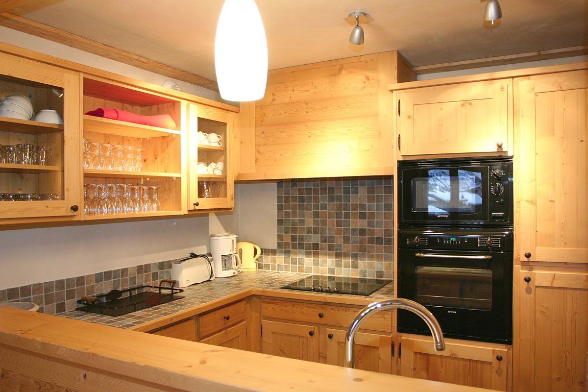 image Prepare a meal in the equipped kitchen.