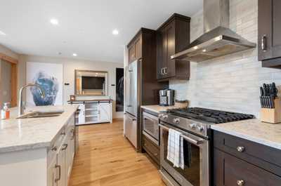 The kitchen is fully equipped with modern appliances.