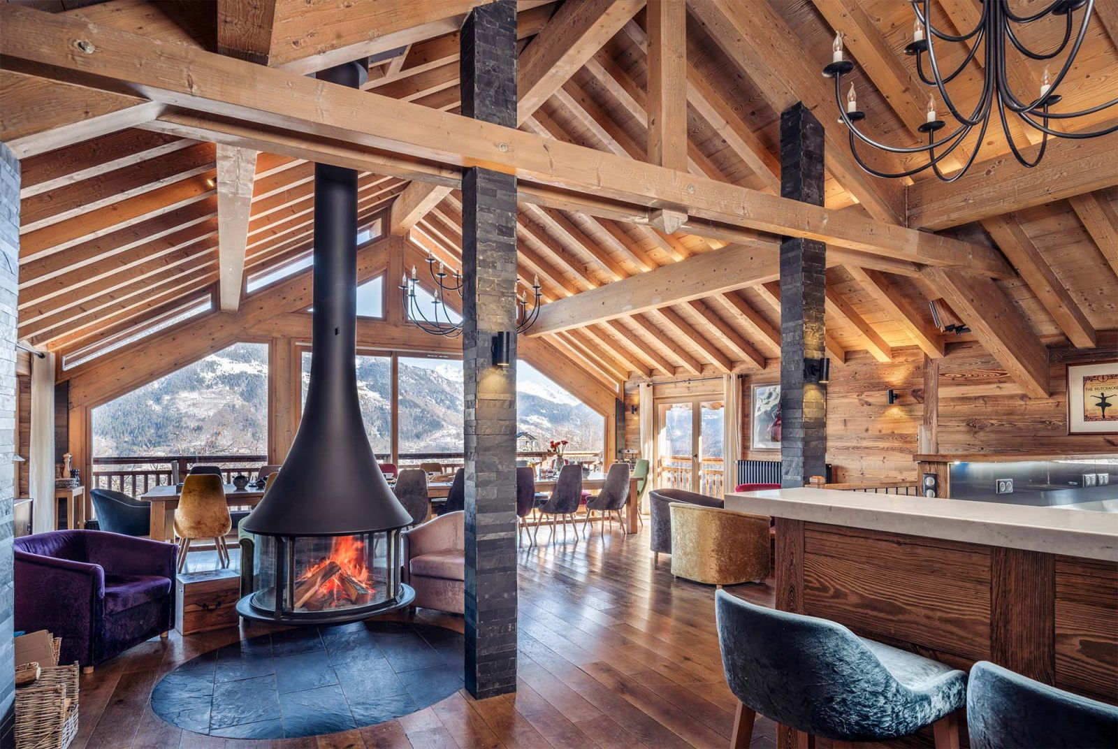 image Rustic wooden living area centred around a wood-burning fireplace