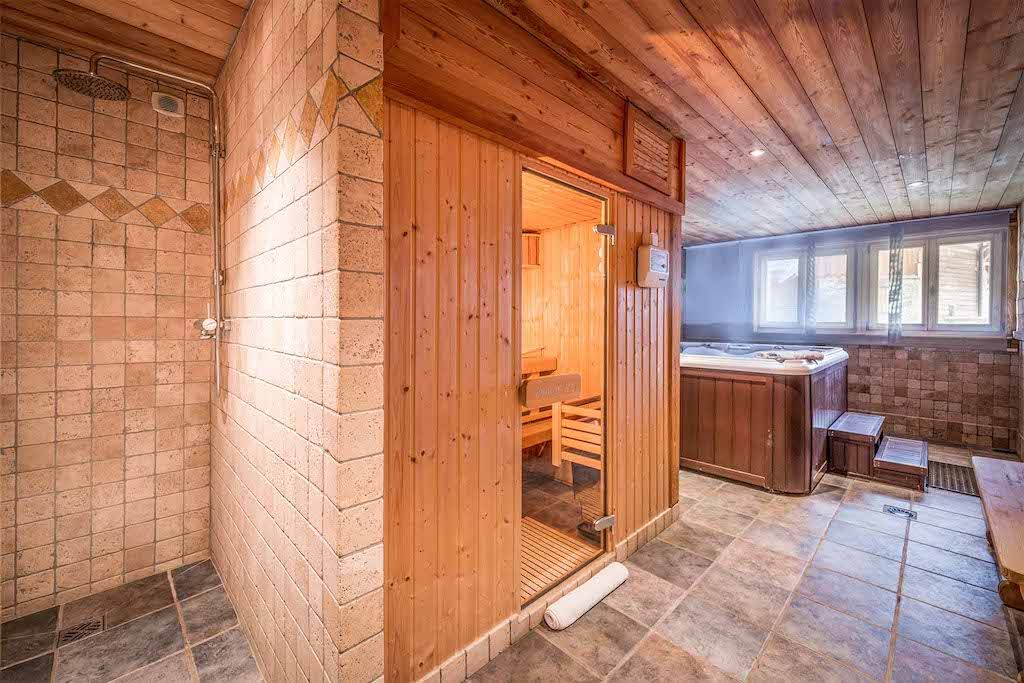 image Soothe your muscles in the private sauna or jacuzzi after a day outside.