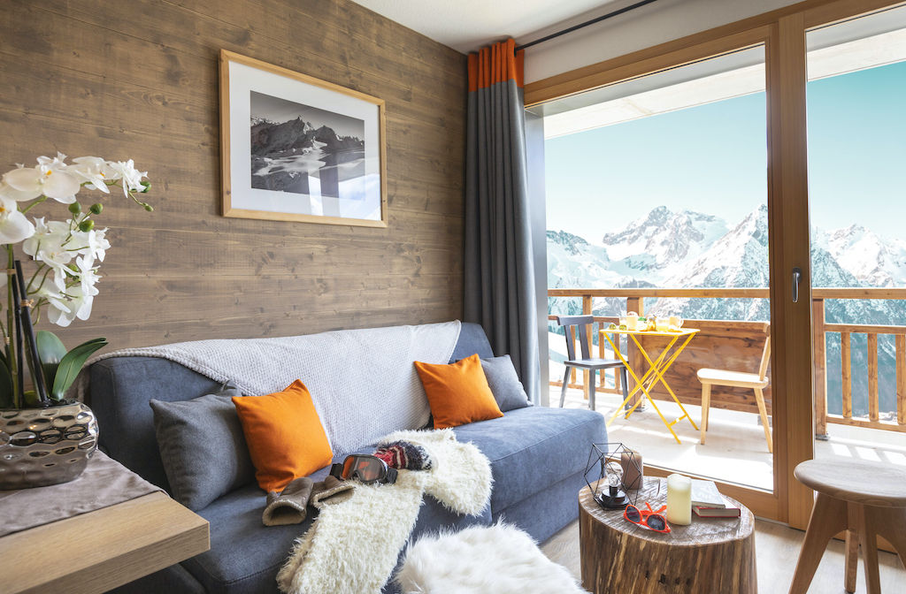 image Kick back and relax on the sofa. Some apartments may feature a balcony or terrace.