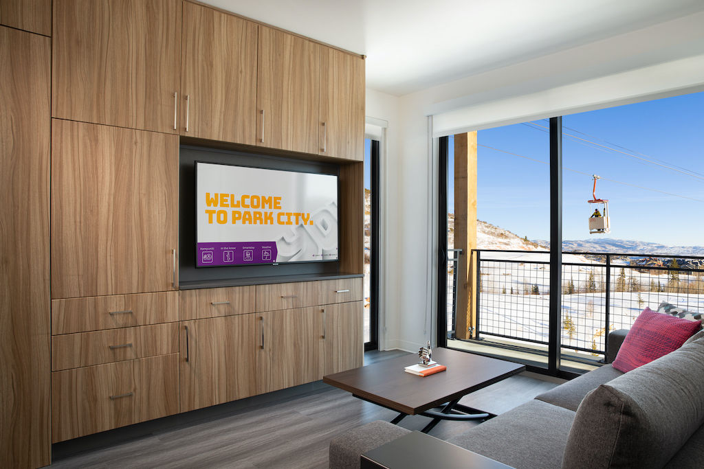 image Relax on the sofa and watch a show on the TV after a day in the sun.