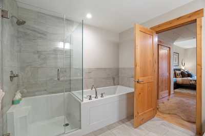 The master bedroom features its own ensuite bathroom. 