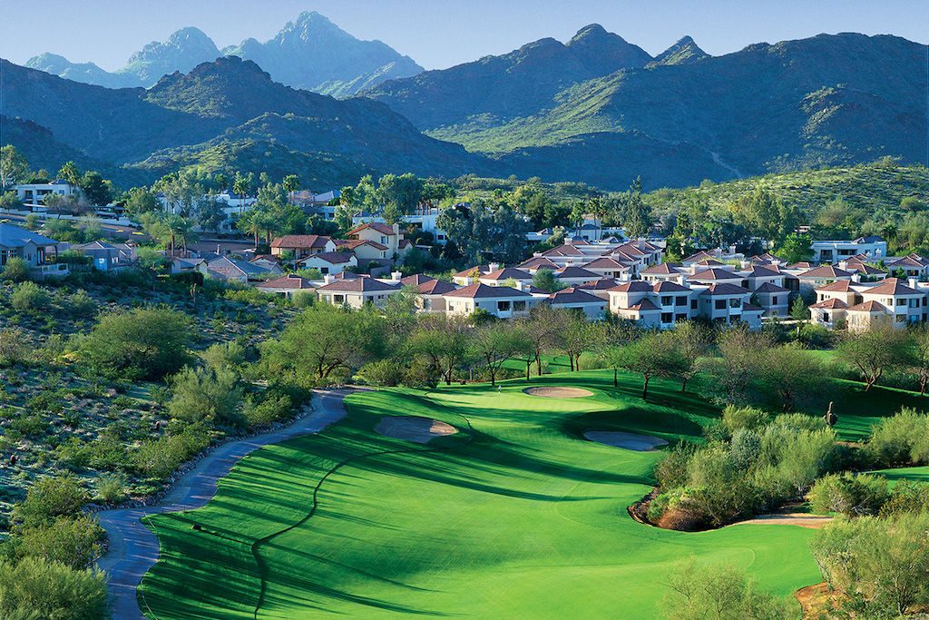 image 18-hole golf with a view of the mountains.