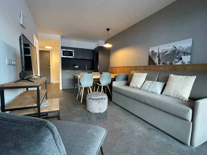 image Relax and unwind in the cozy living room.