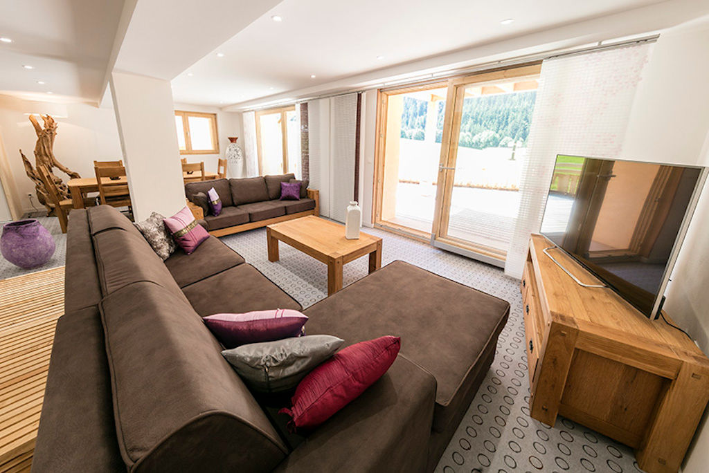 image Take a seat on the comfortable sofa in the living area and enjoy a show on TV. Please note photos are representative and actual unit may differ.