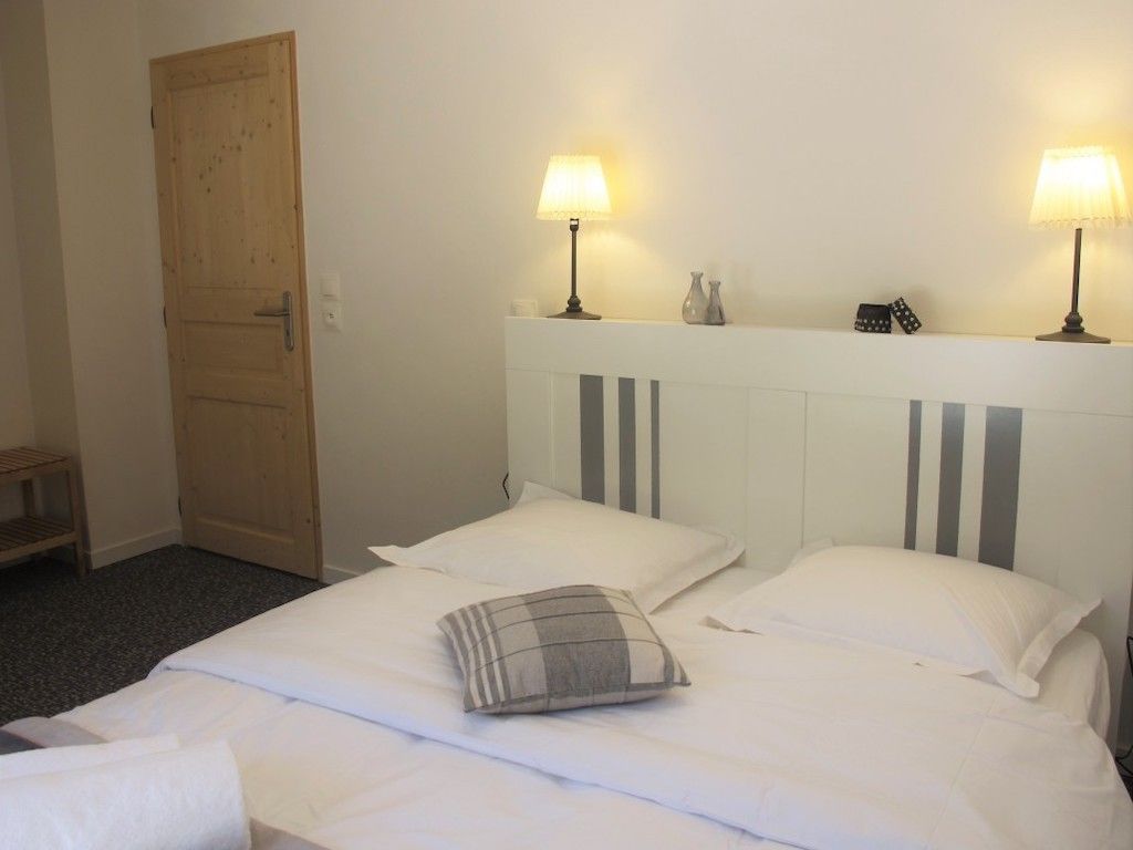 image Get a peaceful night's sleep in our cozy bedroom. Please note photos are representative and actual unit may differ.