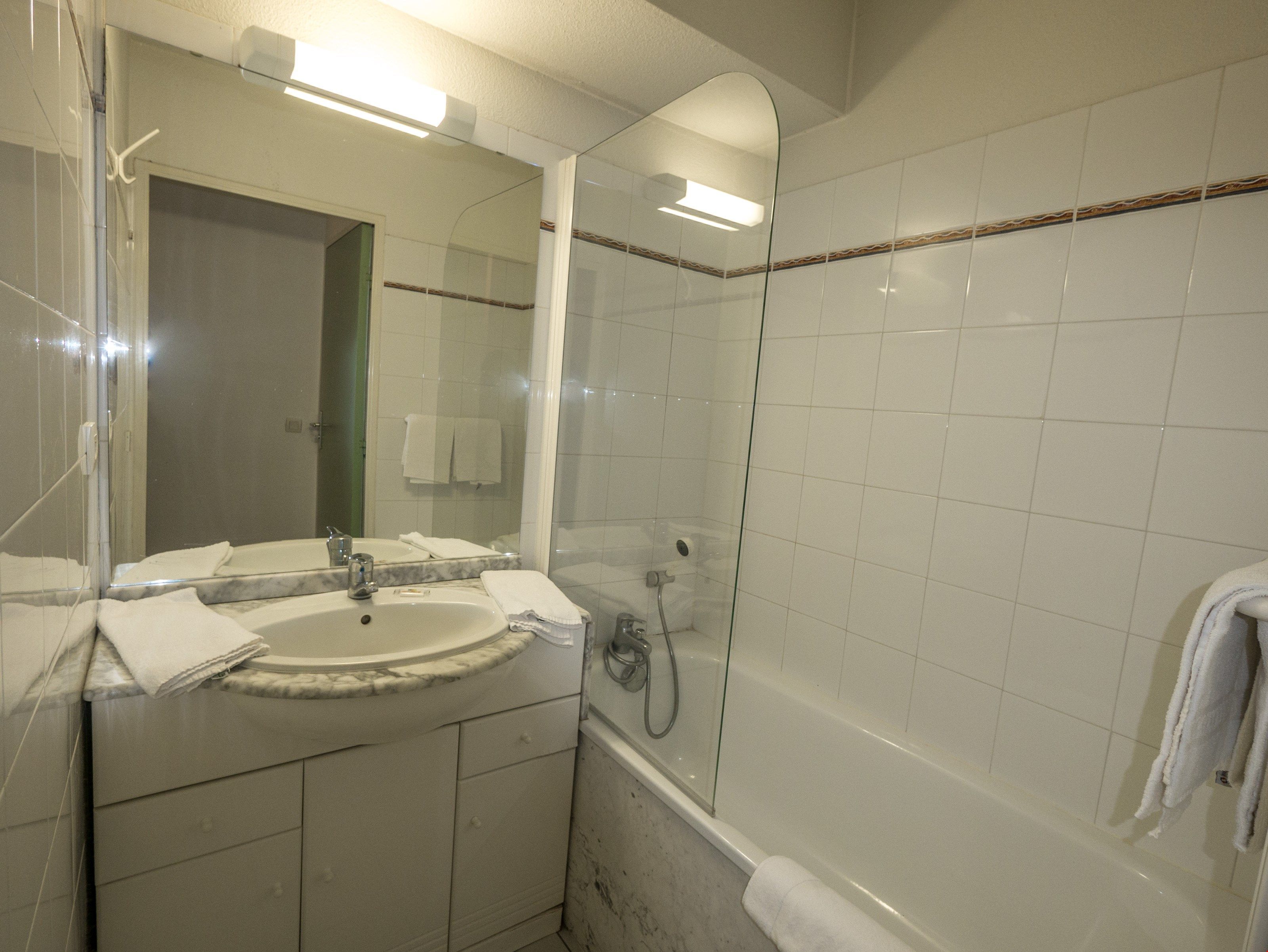 image Get ready for your day in the lovely bathroom.