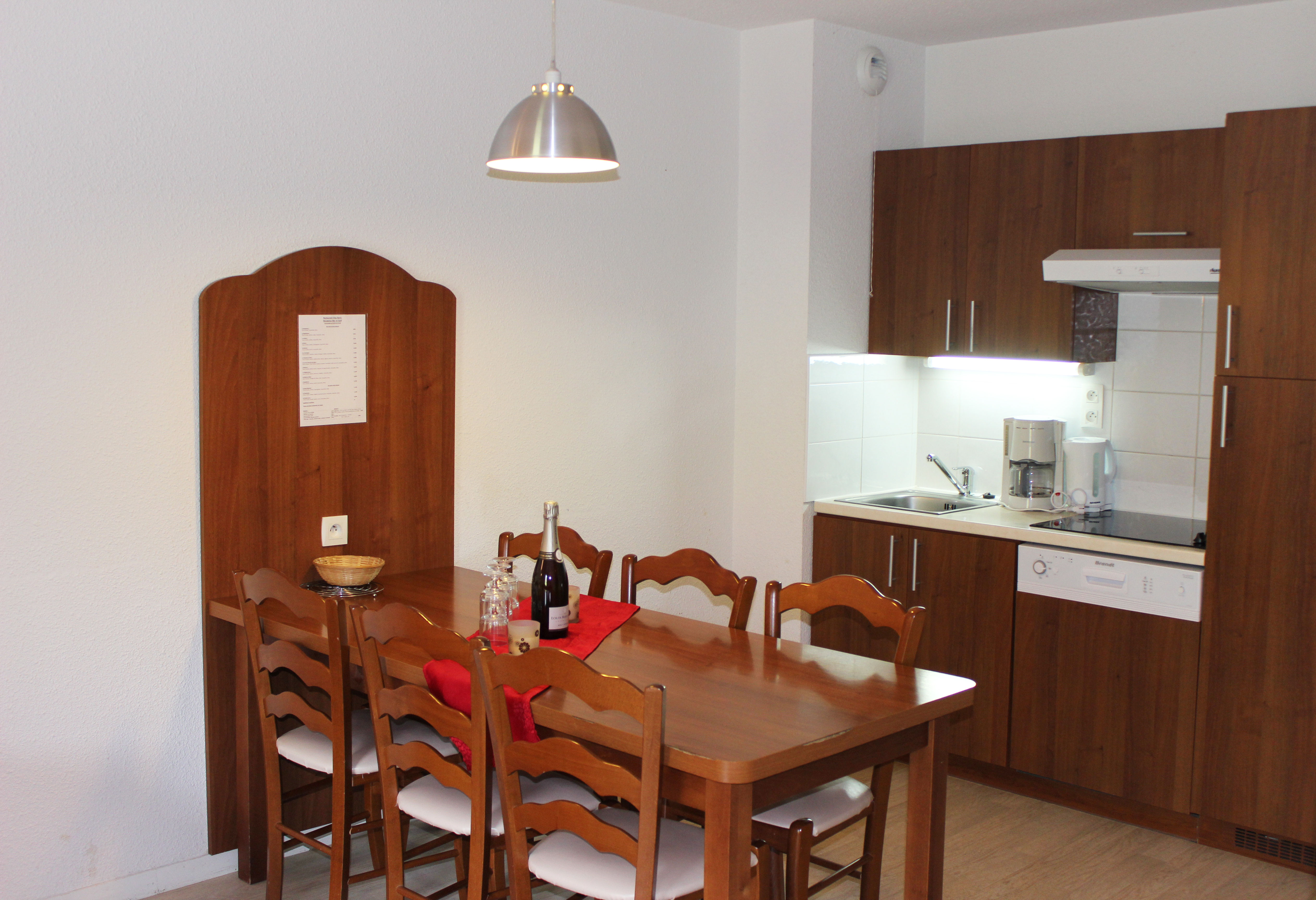 image Reconnect with loved ones over a meal at the dining table.