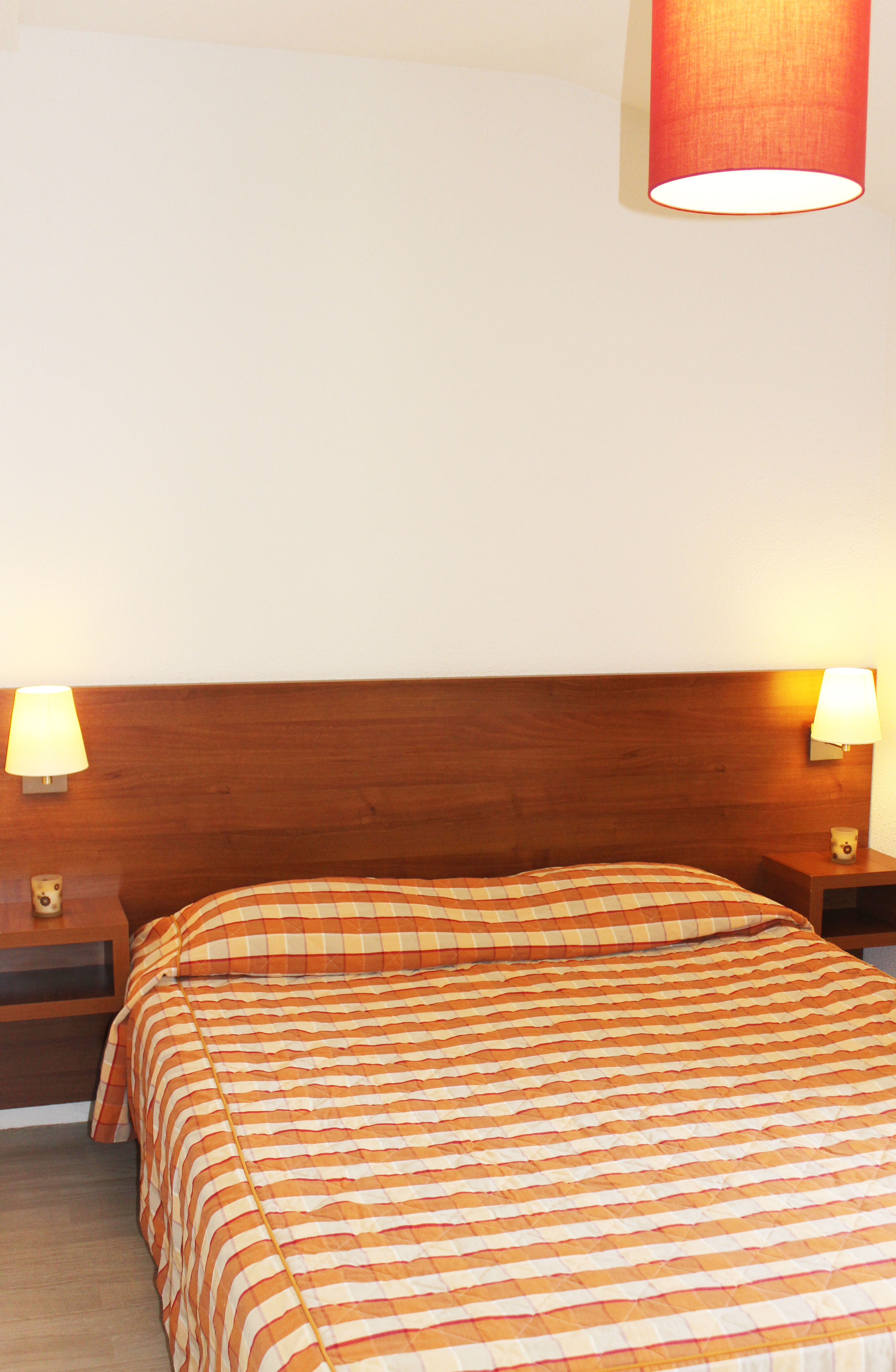 image Drift to sleep in a comfortable bed after a wonderful day outside.