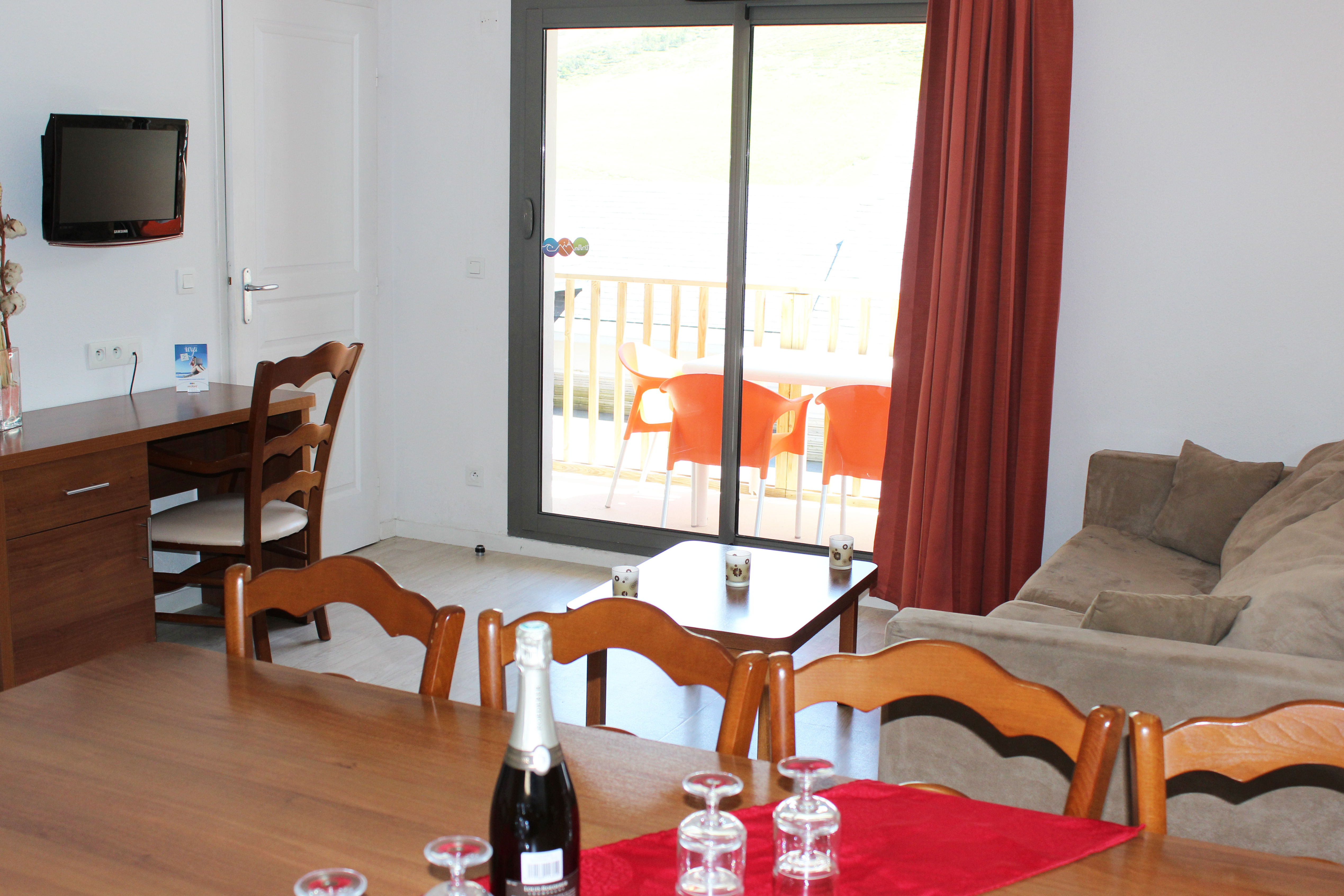 image Settle into the dining area and enjoy a nice meal.