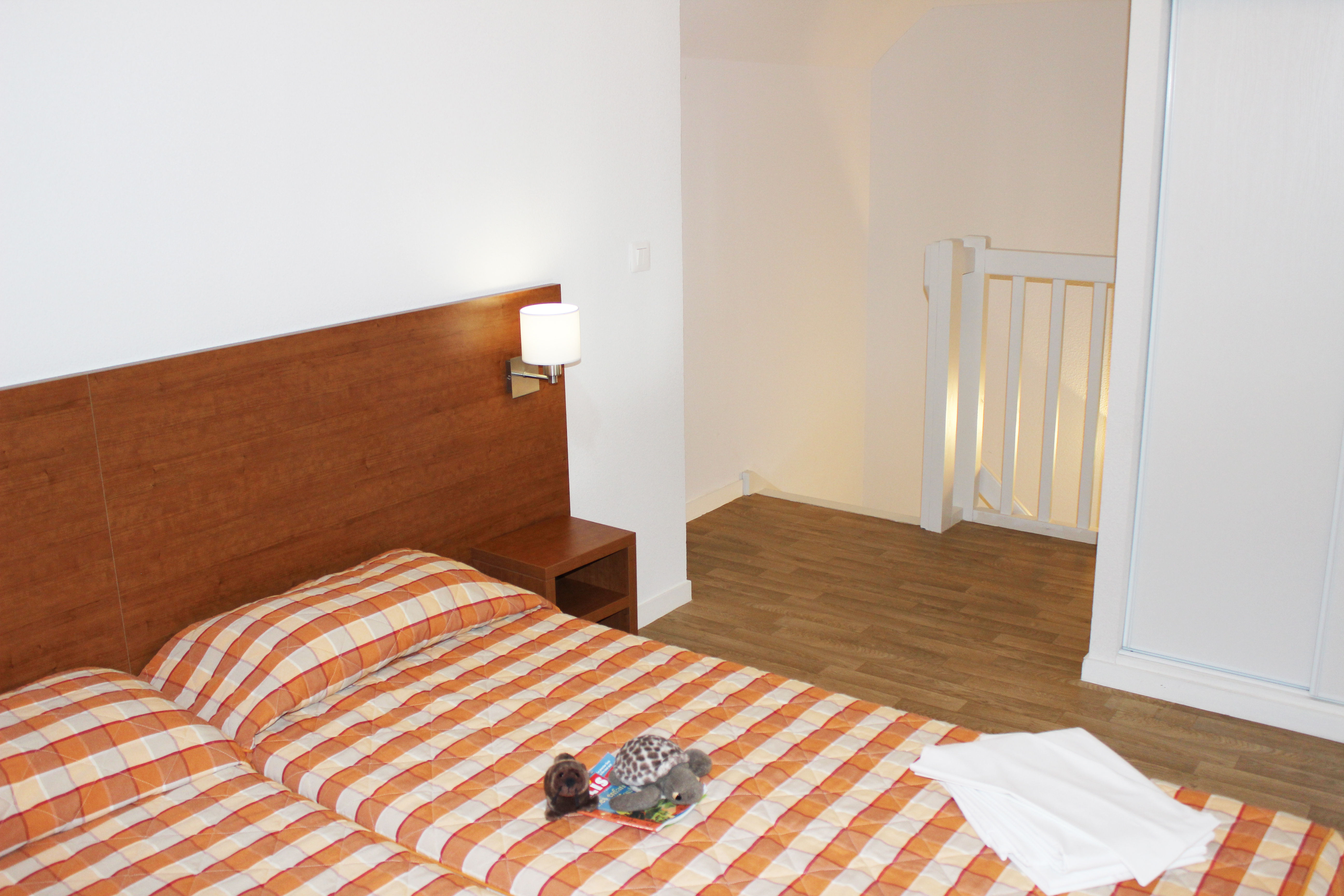 image Drift to sleep in one of the comfortable bedrooms.