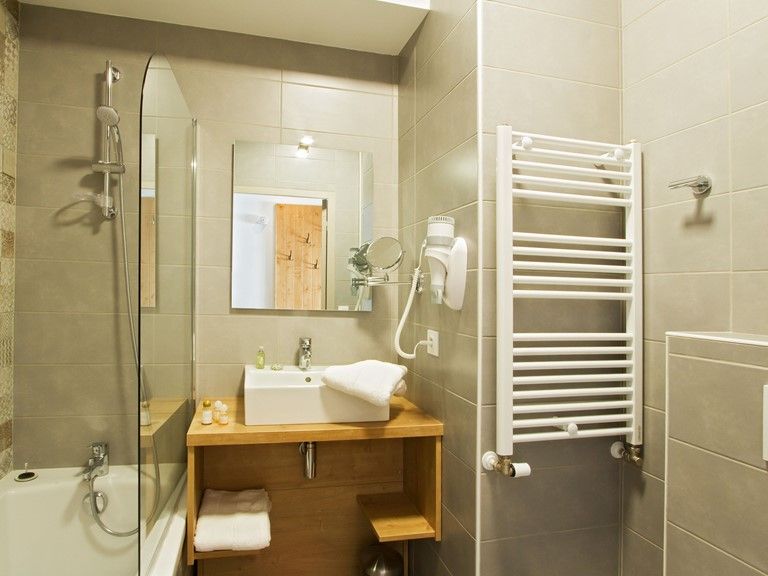 image Get ready for your day in the bathroom.