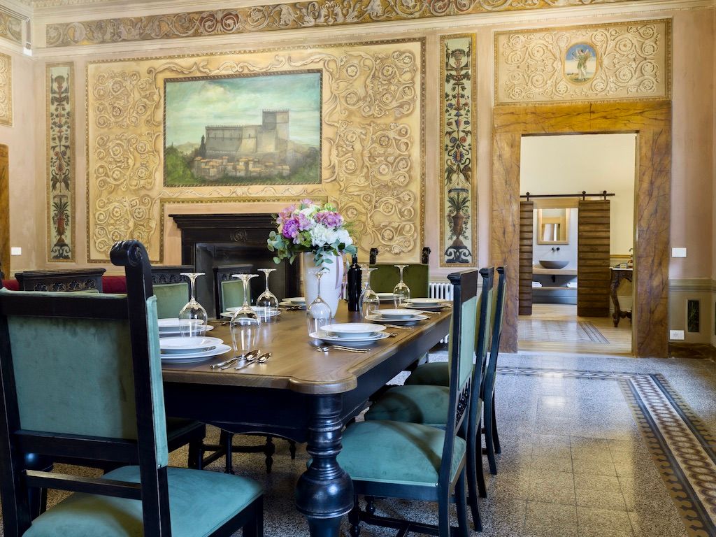 image The grand parlour features a custom dining room table with seating for eight.
