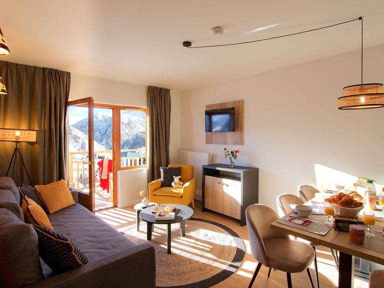 image Relax and rejuvenate in the cozy living room.